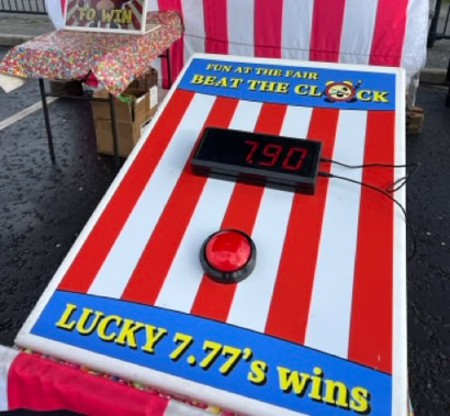 beat the clock, stop the clock at 7.77 secs to win, carnival game hire northern ireland